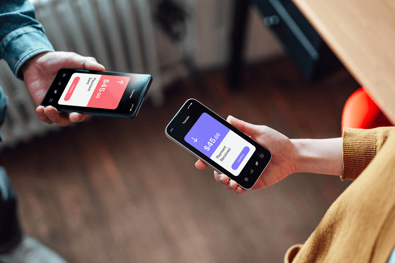 two phones held by two different people's hands